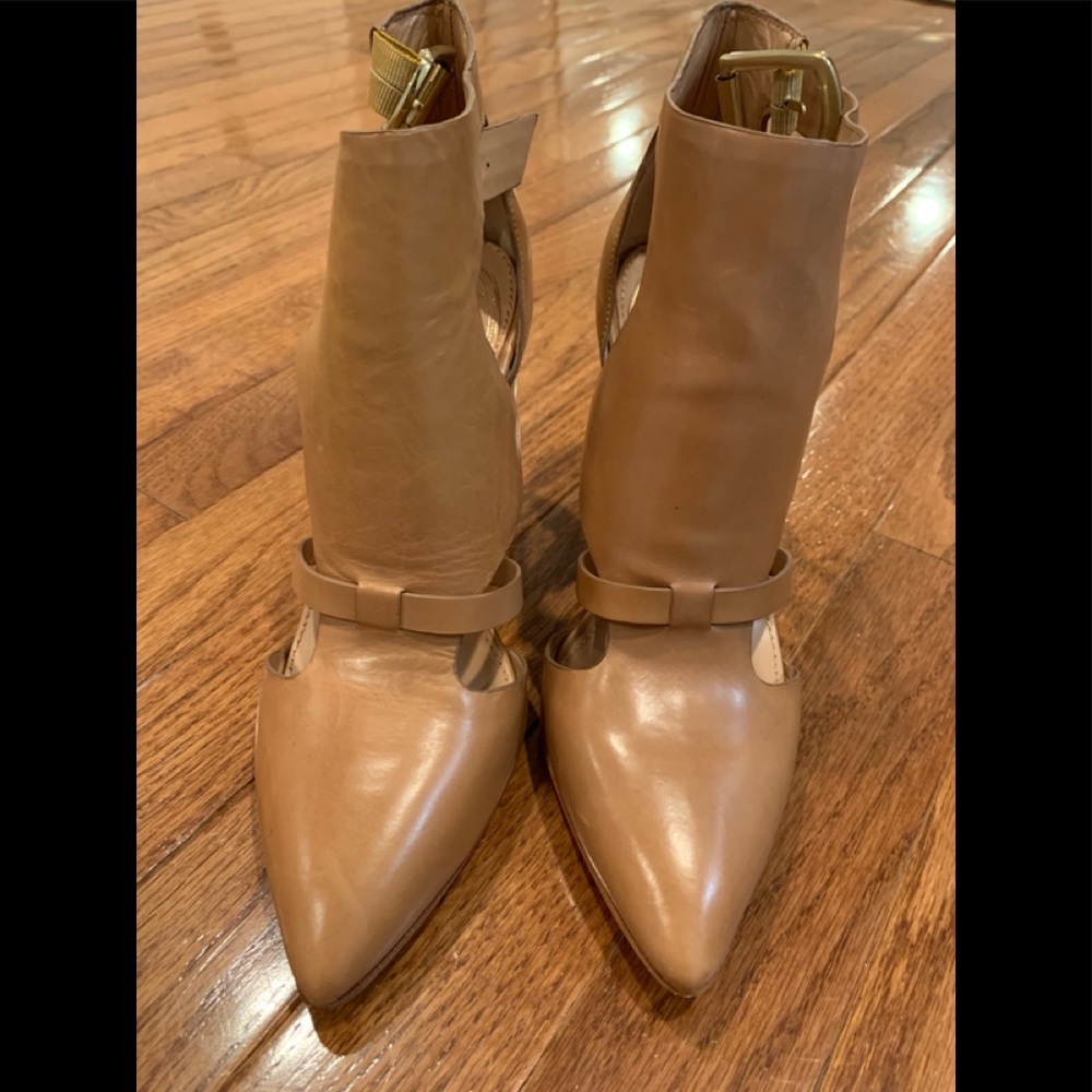 New Vince Camuto signature leather ankle bootie .